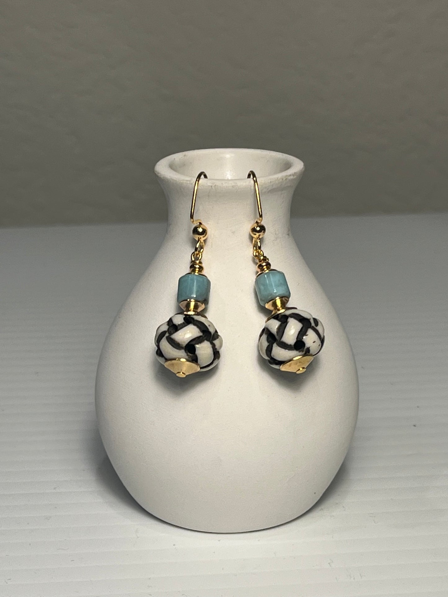 Carved Amazon Earrings